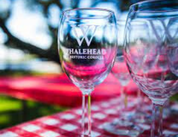 Whalehead Wine Glasses on a Table at the Corolla Cork & Craft Farmers Market