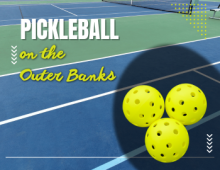 Pickleball on the Outer Banks Pickleball court with 2 neon pickleballs.