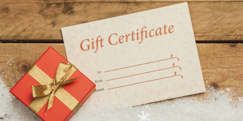 Gift Certificate Gift Certificate with red present box and snow.