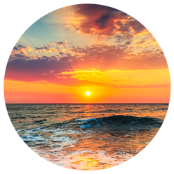 colorful pink and orange sunrise over the ocean